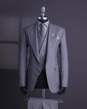 A Light grey, ivory pencil stripe, jorgecarli, knitted, peak lapel suit