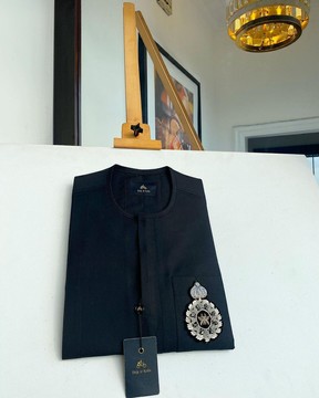 A charcoal black kaftan, front flap, &amp; hand embroidery patch detailing
