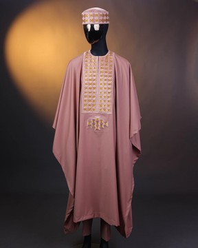 A mauve , connected square embroidery design with matching gold Swarovski stone details agbada