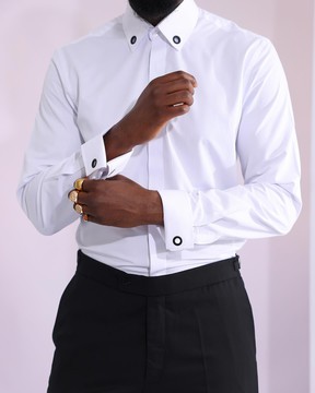 A white, black eyelet &amp; double cuff shirt.