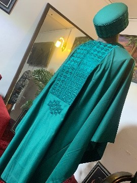 An army green AGBADA